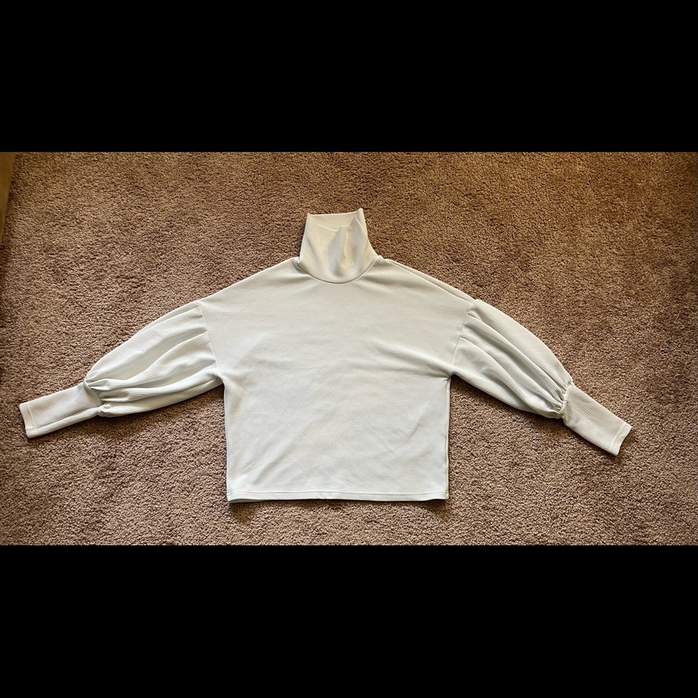 White textured turtleneck